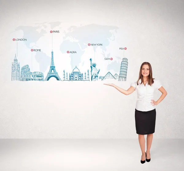 Business woman presenting map with famous cities and landmarks — Stock Photo, Image