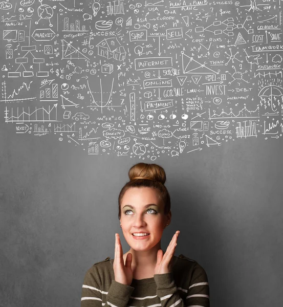 Jonge vrouw met getekende grafieken boven haar hoofd gebaren — Stockfoto