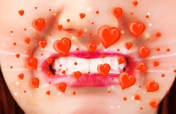 Pretty lady lips with lovely red hearts — Stock Photo, Image