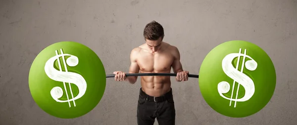 Muscular man lifting green dollar sign weights — Stock Photo, Image