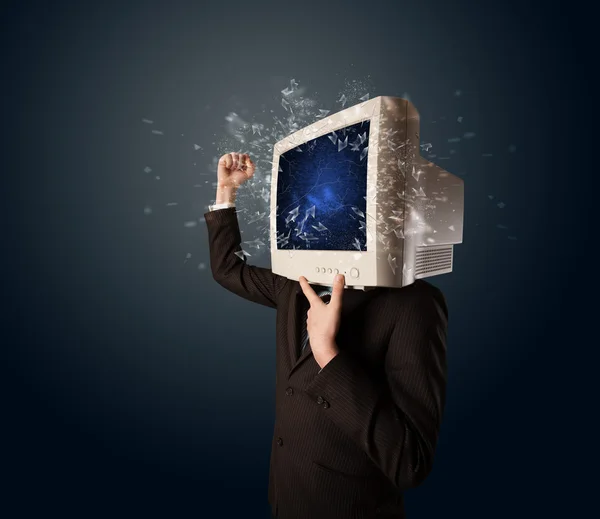 Computer monitor screen exploding on a young persons head — Stock Photo, Image