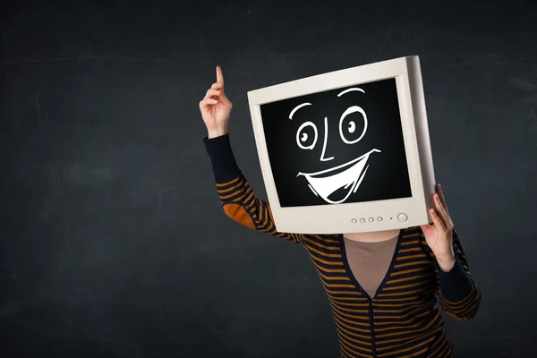 Girl with a monitor head and a cheerful cartoon face — Stock Photo, Image