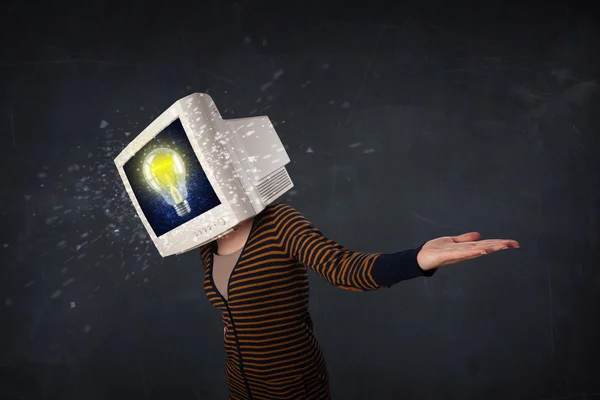 Girl with a monitor head, idea light bulb on the display s — Stock Photo, Image