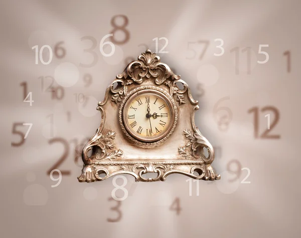 Vintage clock with numbers on the side — Stock Photo, Image