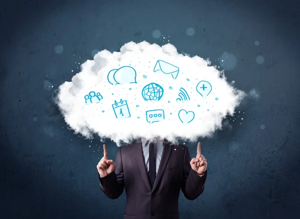 Man in suit with cloud head and blue icons — Stock Photo, Image