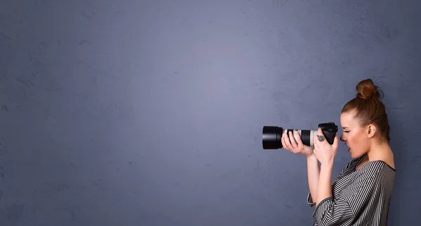 Photographer shooting images with copyspace area — Stock Photo, Image