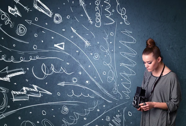 Photographer shooting images while energetic hand drawn lines an — Stock Photo, Image