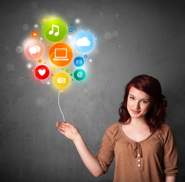 Woman holding social media balloon — Stock Photo, Image