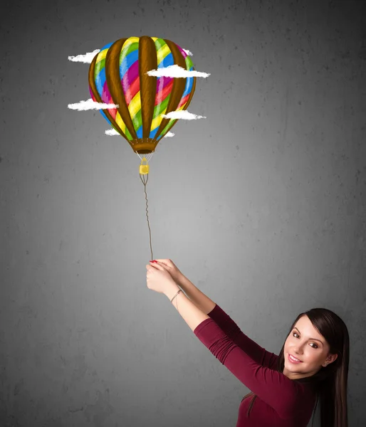 Woman holding a balloon drawing — Stock Photo, Image