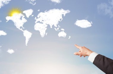 Dünya bulutlar ve mavi gökyüzü güneş gösteren bir el