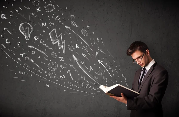 Young man reading a book — Stock Photo, Image