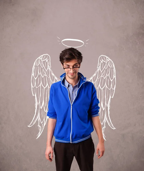 Young man with angel illustrated wings — Stock Photo, Image