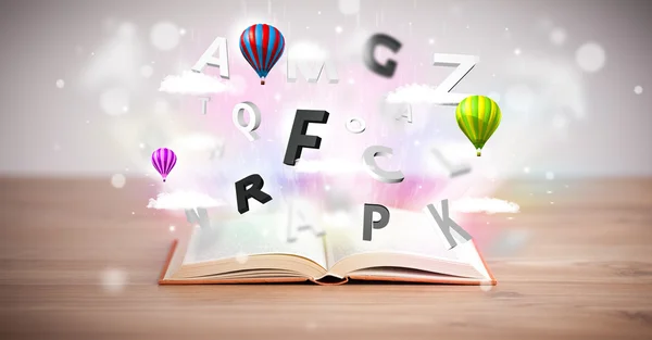 Libro aperto con volare lettere 3d su sfondo di cemento — Foto Stock