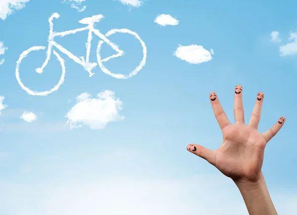 Happy smiley vingers kijkend naar een fiets vormgegeven wolk — Stockfoto
