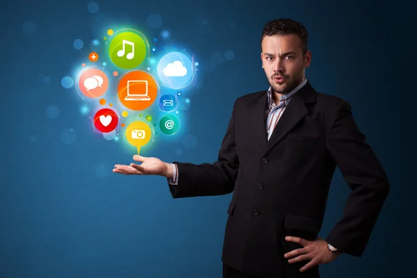 Multimedia icons in the hand of a businessman — Stock Photo, Image