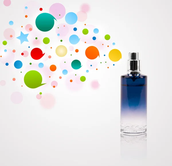 Perfume bottle spraying colored bubbles — Stock Photo, Image