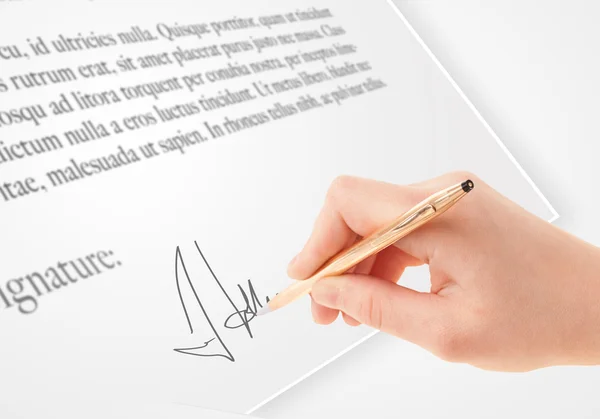 Hand writing personal signature on a paper form — Stock Photo, Image