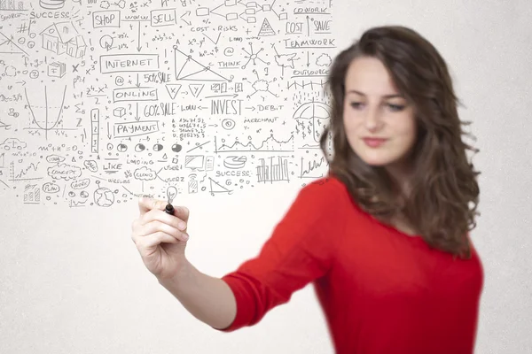 Junge Frau skizziert und berechnet Gedanken — Stockfoto