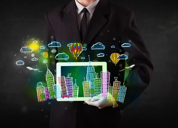 Young person showing tablet with hand drawn cityscape — Stock Photo, Image