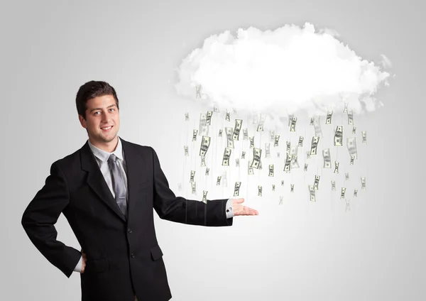 Homem com nuvem e dinheiro conceito chuva — Fotografia de Stock