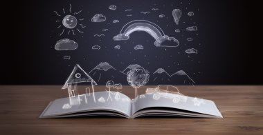 Elle çizilmiş peyzaj ile açık kitap 
