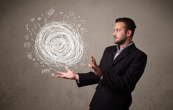 Chaos-Konzept in der Hand eines Geschäftsmannes — Stockfoto