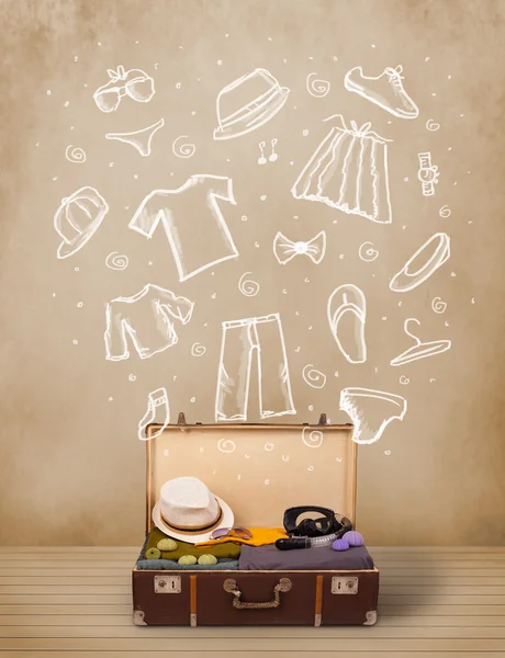 Traveler luggage with hand drawn clothes and icons — Stock Photo, Image