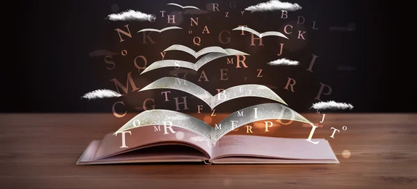 Pagine e lettere luminose che volano fuori da un libro — Foto Stock