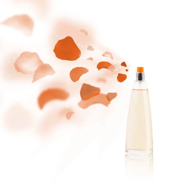 Erfume bottle spraying rose petals — Stock Photo, Image