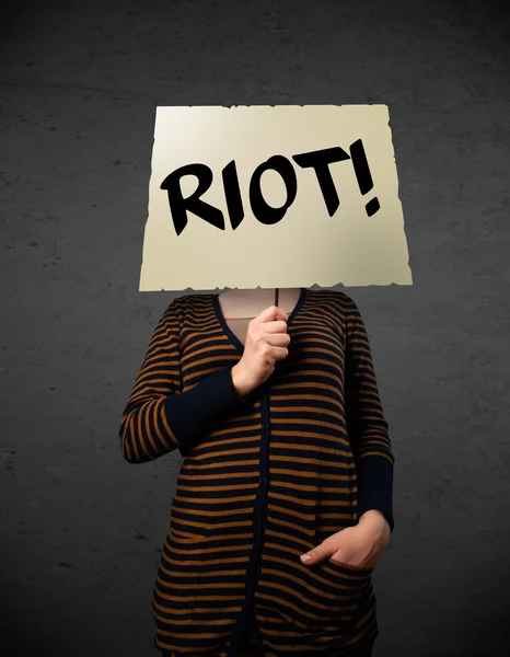 Young woman holding a protest sign — Stock Photo, Image