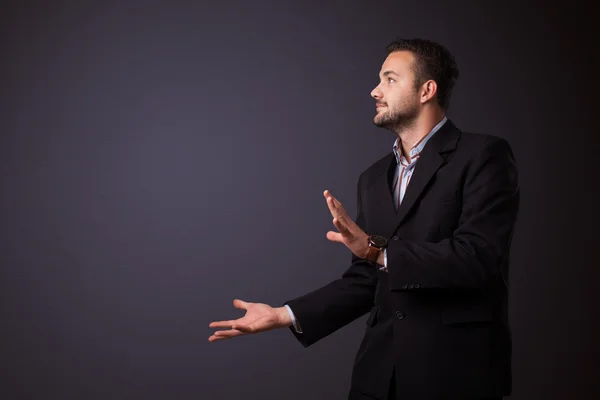 Businessman presenting copy space — Stock Photo, Image