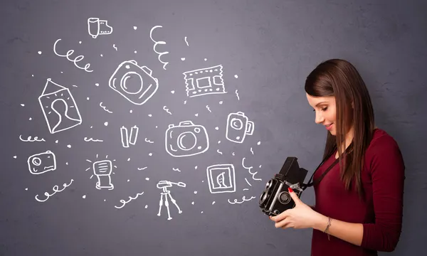 Menina fotógrafa fotografar ícones — Fotografia de Stock