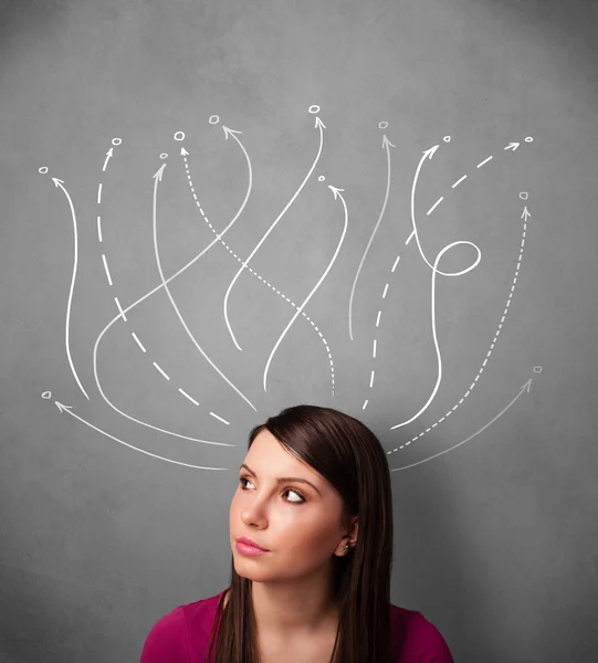 Young woman with arrows coming out of her head — Stock Photo, Image