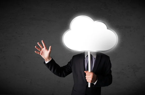 Businessman holding a cloud — Stock Photo, Image