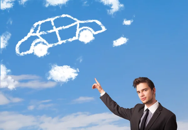 Handsome young man looking at car cloud on a blue sky