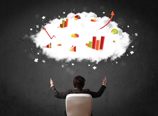 Businessman with charts in a cloud above his head — Stock Photo, Image