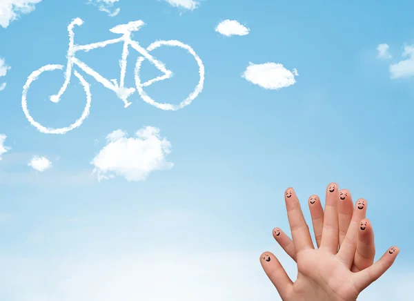 Felices dedos sonrientes mirando una nube en forma de bicicleta — Foto de Stock