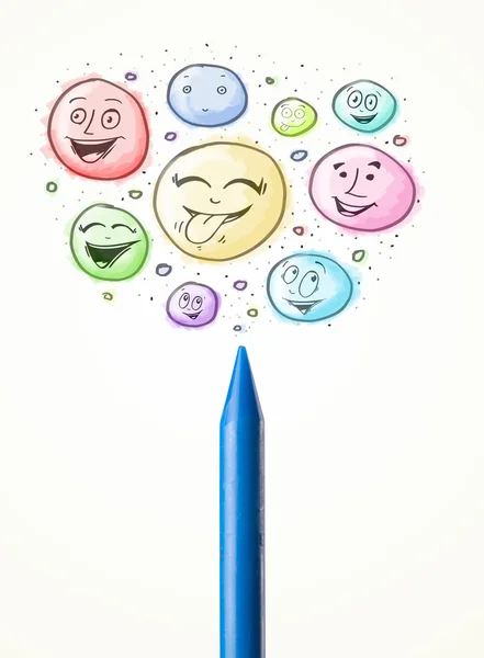 Smiley faces coming out of crayon — Stock Photo, Image