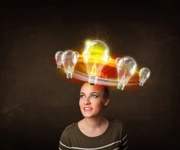 Woman with light bulbs circleing around her head — Stock Photo, Image