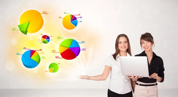 Business woman with colorful graphs and charts — Stock Photo, Image