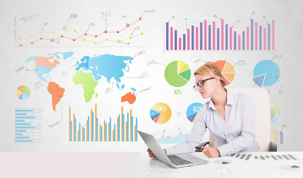 Business woman with colorful charts — Stock Photo, Image