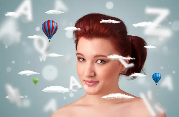 Beautiful young woman with wellness and healthcare clouds — Stock Photo, Image