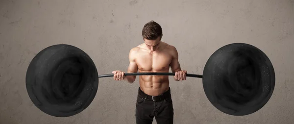 Muscular man lifting weights — Stock Photo, Image