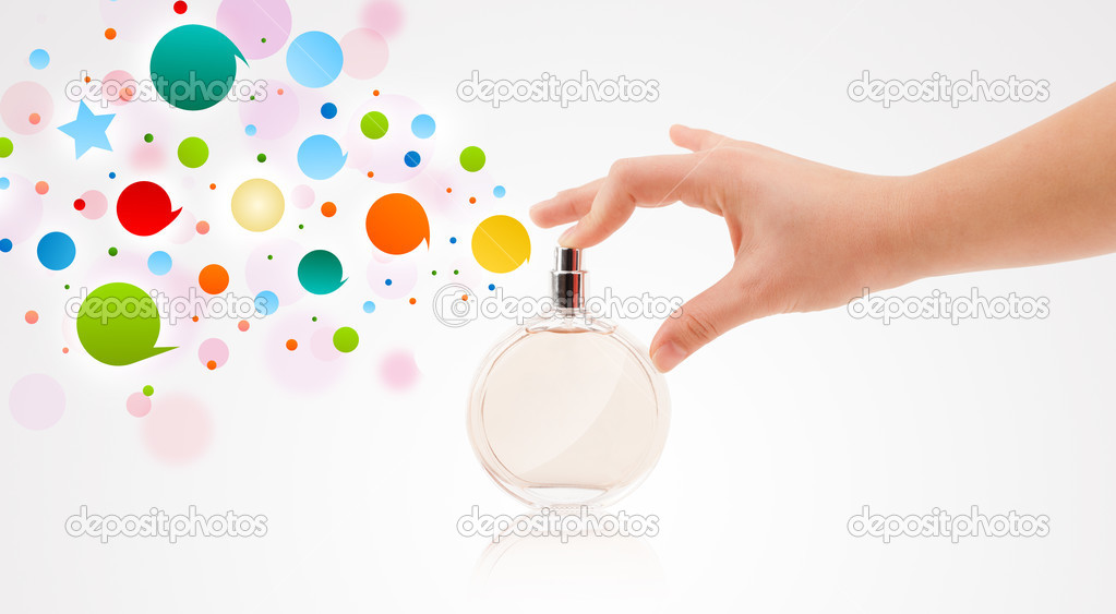 woman hands spraying colorful bubbles