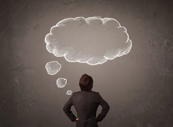 Empresário com a nuvem pensada acima de sua cabeça — Fotografia de Stock