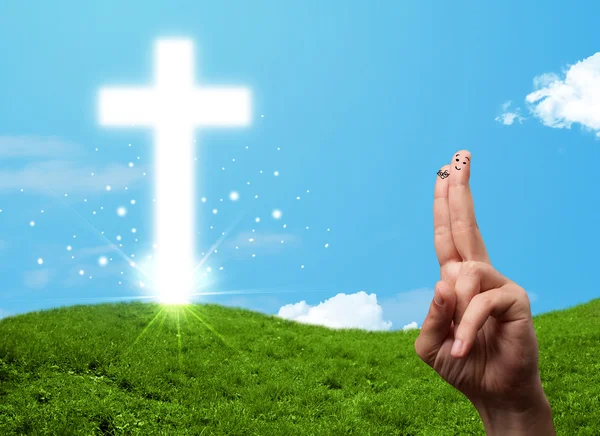 Happy finger smileys with christian religion cross — Stock Photo, Image