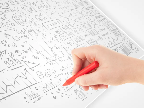 Menschliche Hand skizziert Ideen auf weißem Papier — Stockfoto