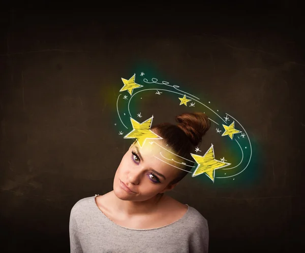 Girl with yellow stars circleing around her head illustration — Stock Photo, Image