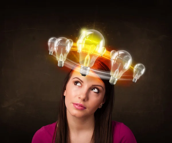 Woman with light bulbs circleing around her head — Stock Photo, Image