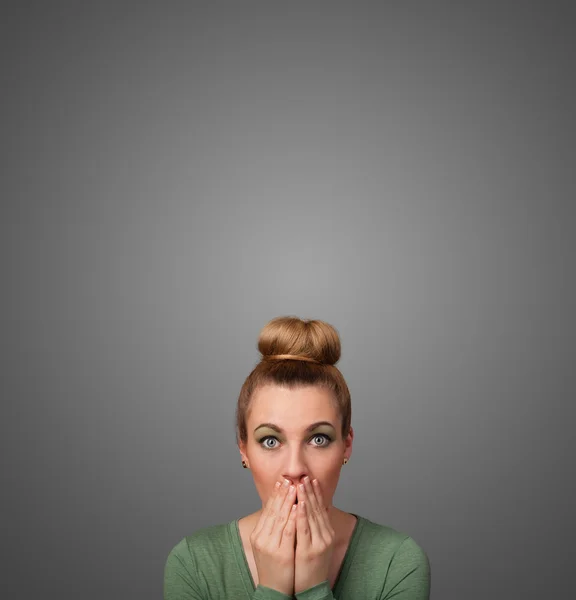 Thoughtful young woman gesturing with copy space — Stock Photo, Image